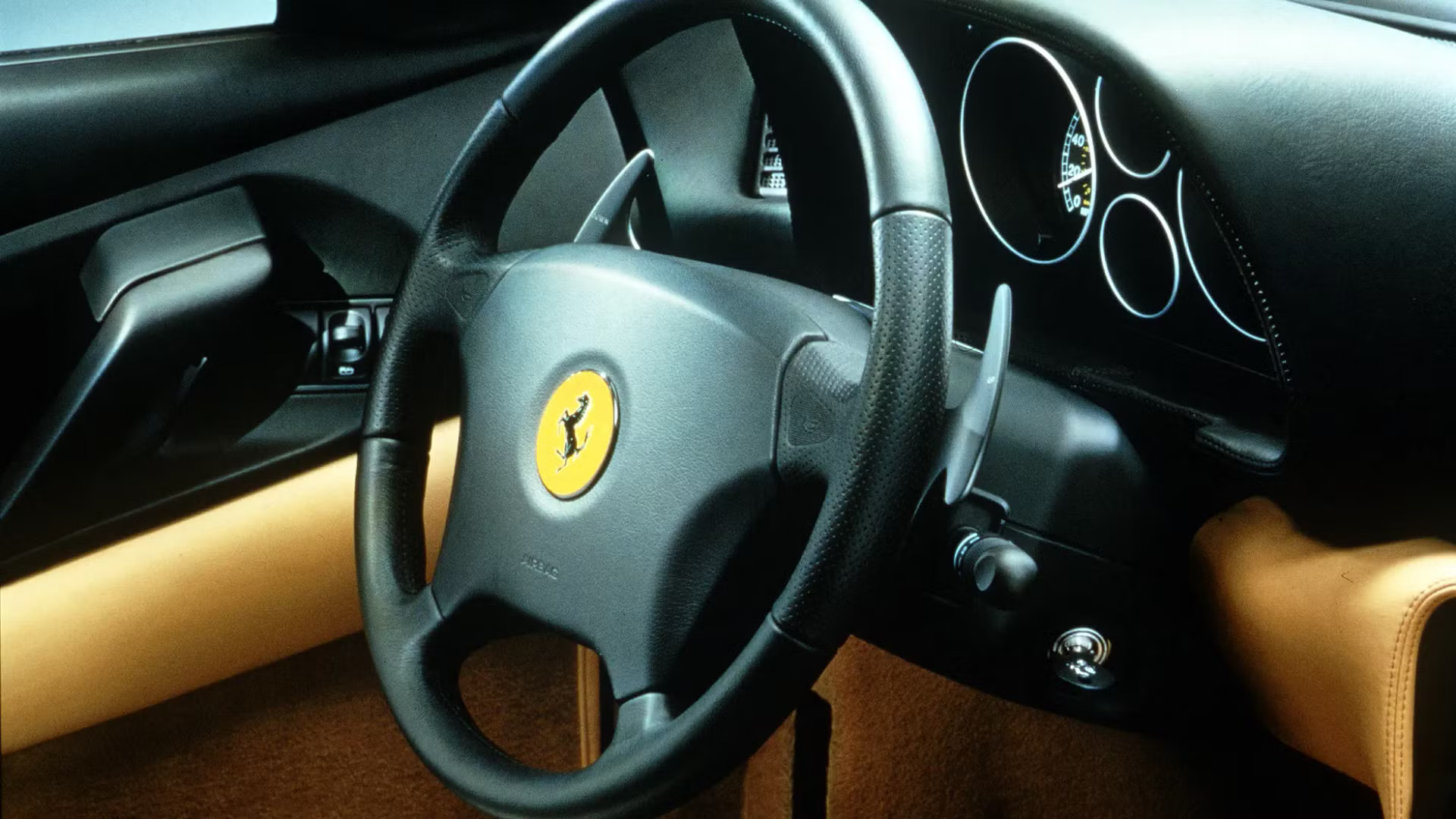 Ferrari F355 F1 paddle-shifter behind the steering wheel